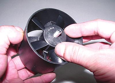 tightening nut and fan blade, make sure hand is placed in right position