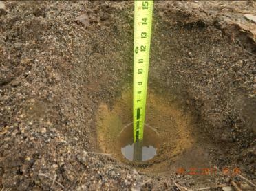 Pump down the water and conduct a test pit excavation (as described in Indicator #8) to investigate the mulch, soil media and possible presence of filter cloth (which should NOT be used a separation