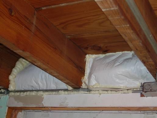 wall at Figure 2172-1: Rigid foam board sealed in place with 2-part spray foam the bottom) without compression. Insulation should be placed in contact with the rim joist.