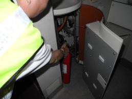 Smoke emitting from base of wall panel under the sink Figure 2: CIC discharging fire extinguisher (illustration only) 1.2 Damage to Aircraft 1.2.1 The aircraft was inspected after landing in Singapore.