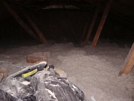 [2] & [3] The pull-down cover is ¼ plywood and has no insulation or weatherstrip. [3] The attic cellulose blow was somewhat uneven but acceptable. [4] & [5] Client items are buried in cellulose.