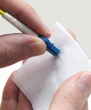 Apply a fiber optic cleaning solution onto a clean fiber wipe. 7.