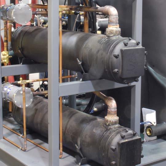 Air flow across the condenser is achieved via a motor driven fan assembly. The air-cooled condenser is located outdoors on most Titan central chillers.