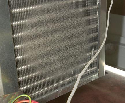 Condenser Radiator For efficient refrigeration performance, the condenser radiator must be kept clean, (see Servicing, Condenser Radiator). Accumulated dust and fluff.