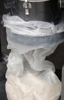 CONTINUOUS BAGGING SYSTEM CON T **CAUTION: DO NOT ALLOW THE TIED-OFF BAG TO INTERFERE WITH THE