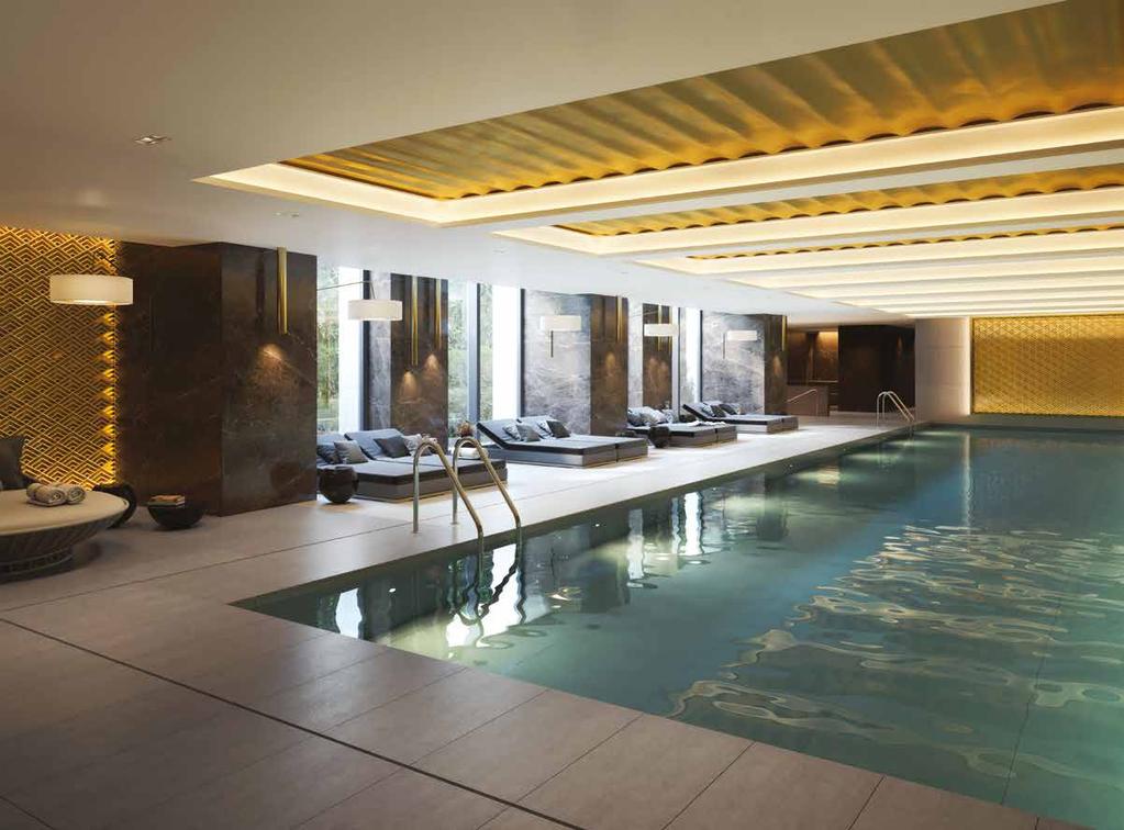 Swimming pool With its fluted ceiling, ambient lighting and rich metallic accents, the expansive swimming pool