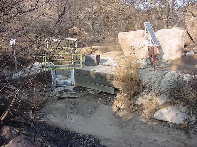 Outfall 001 (Southeast) After 2005 Fire BMPs Damaged Vegetation along streambed either completely destroyed or heavily damaged.