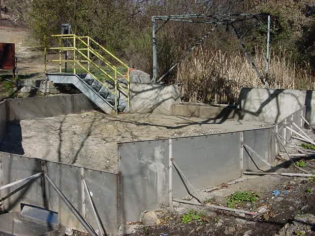 Outfall 011, 2 Months After 2005 Fire BMPs Implemented Silt fence installed at discharge to Perimeter Pond.