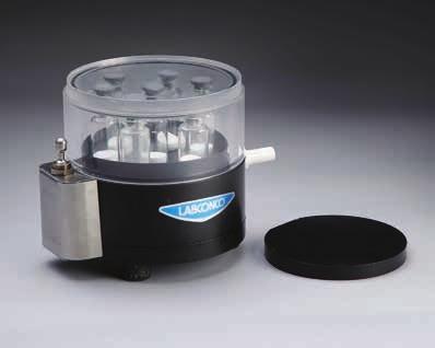After freeze drying is complete, the stoppering handle may be turned, slowly moving the top plate downward until it makes contact with the sample containers on the top shelf and the sample containers