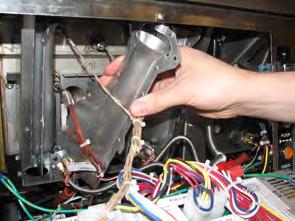 breaker, or unplug cord at wall receptacle. 2. Lower the control board (refer to the Control Board section).
