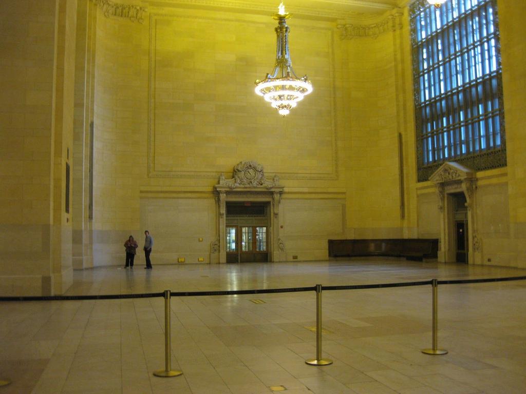 This is a picture of Vanderbilt Hall in the terminal. It used to have a large amount of benches to have people wait for trains, but after New York was losing money, the hall was filled with homeless.