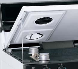 Lift-up cooktop with easy-clean subtop Cooktop lifts up to