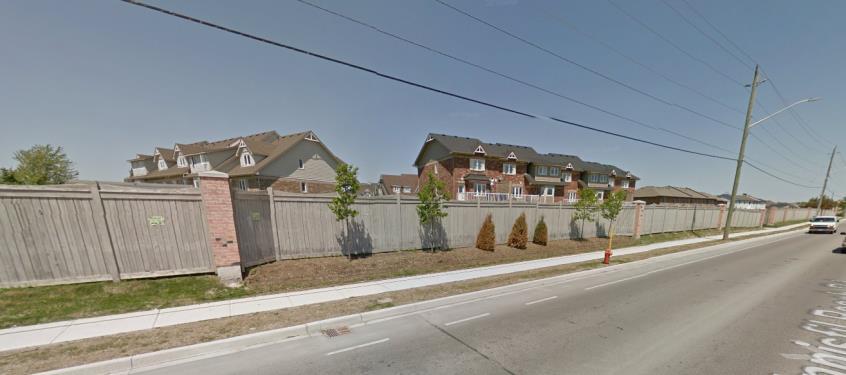 Figure 12 - View along Innisfil Beach Road. These dwellings are rear facing, creating a dull streetscape.