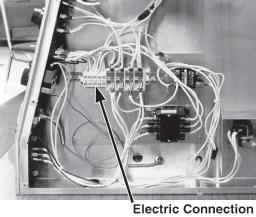 2-6. ELECTRIC CONNECTION The electrical power can be connected from the bottom or from (Continued) the operator s side. There is a 1-3/32 inch diameter hole from either connection.