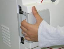When System Ready is displayed on the screen, open the door as follows: 1. Place your thumb on the plastic door cover (1) and the other fingers in the handle (3). 2.