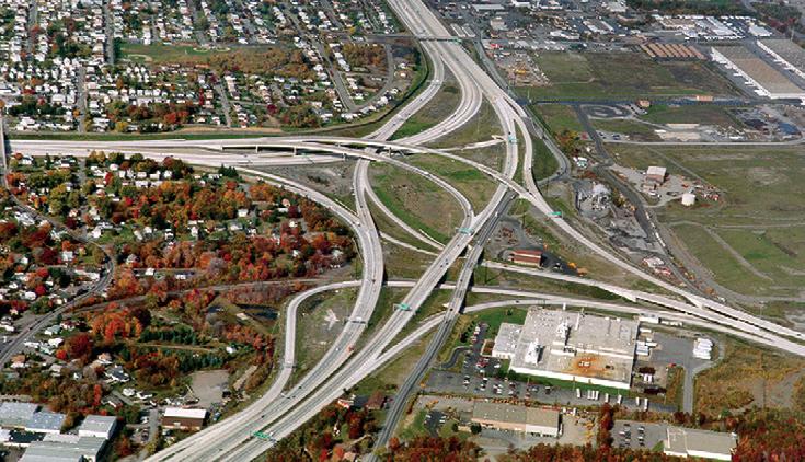 Highway projects encompass route alignment planning, interchange development, road relocations, toll plazas, drainage and storm water management, traffic modeling, and noise impact evaluation.