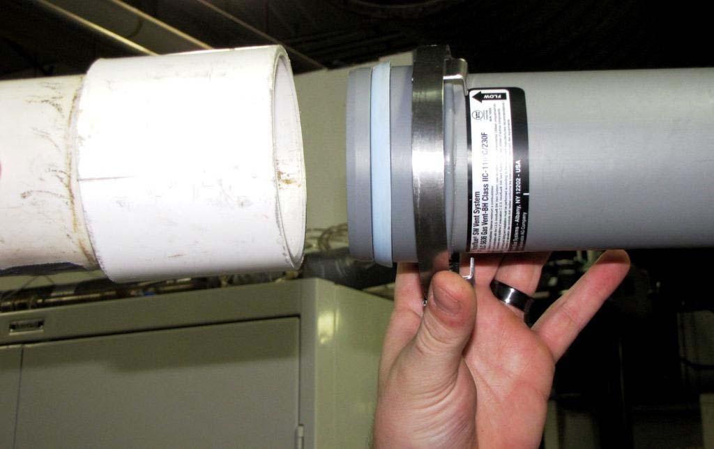 A reducer coupling may be needed to use the supplied vent terminals if a larger pipe diameter size was used. Cement the straight section of PVC pipe to the PVC pipe coupling.