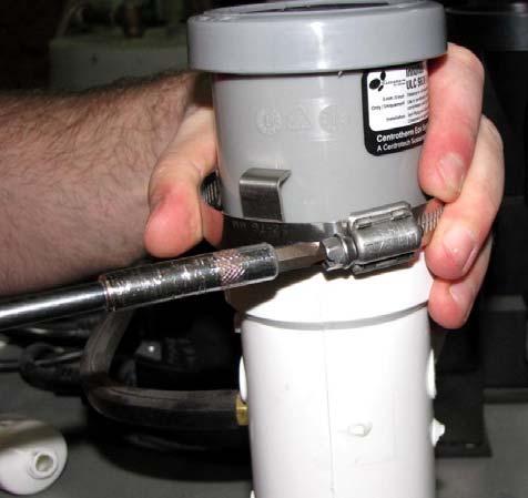 the Flue Clamp over the Air Intake Pipe Tee vent models, install the PVC adapter into