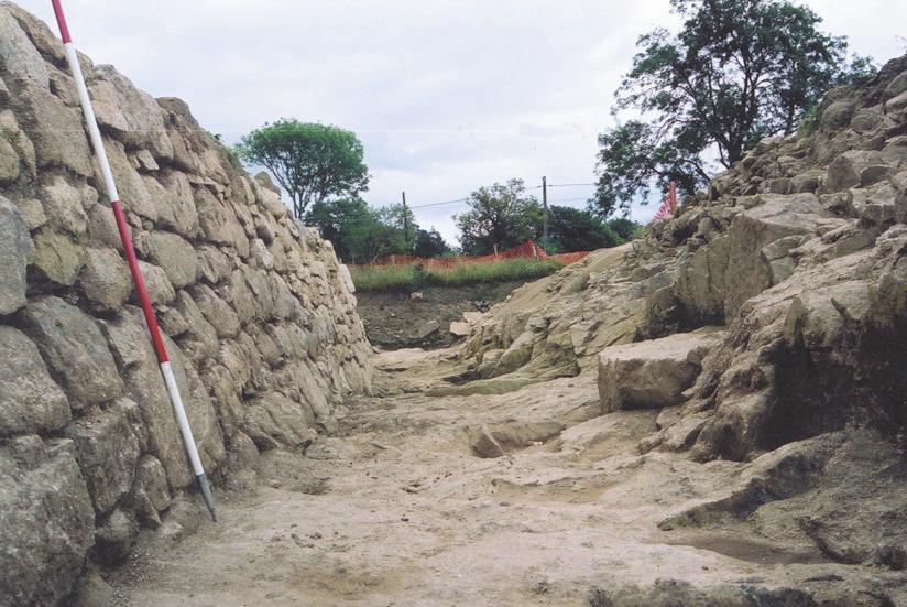 Keeley Ltd) Detail of the quarried, stone-faced defensive ditch at 