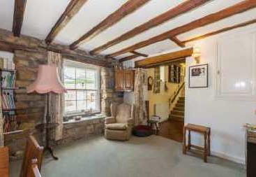 The property boasts numerous original features and an abundance of character.