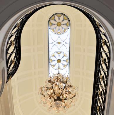 Can a home be called great without a grand staircase? Jean Wiart Above: A lay light of wrought iron figures prominently in the ceiling of a Brooklyn mansion s grand staircase.