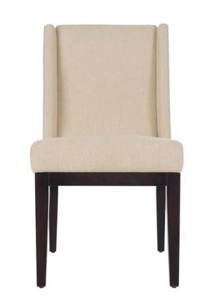 MARTIN CHAIR A simple silhouette, flawless upholstery bring effortless elegance
