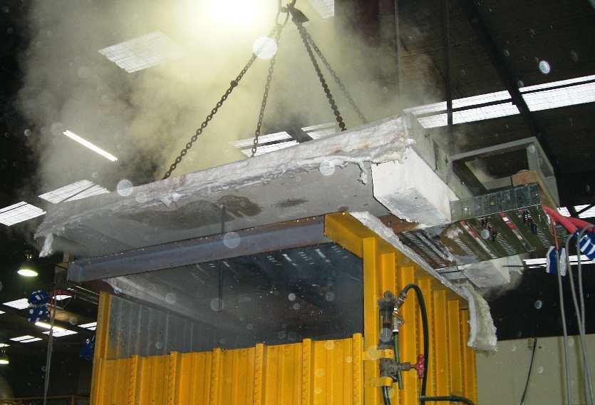 The picture below shows the furnace (fire chamber) after completion of the two hour fire test, where the chamber roof is removed, complete with cable tray and cable in readiness for the water spray