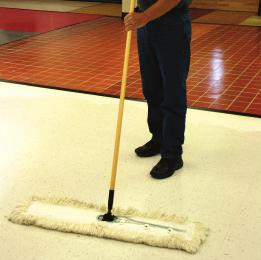 Once you reach the end of the hall, gently shake the dust mop to let dust and debris fall to the floor. Then fluff the mop by lifting it about a foot off the floor and letting it drop.