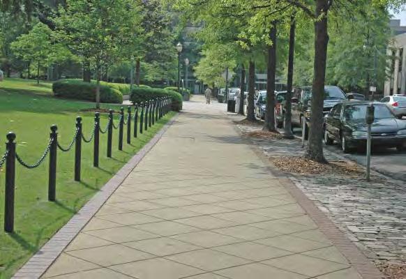 Create standards for sidewalks (including size and materials) that establish a sense of visual continuity. 1d.