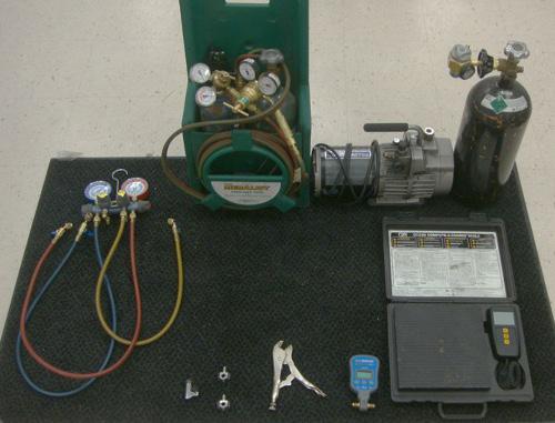 Tools TOOLS USED FOR ALL SYSTEMS INCLUDING HC/R-290 1. Torches 2. Manifold set 3. Vaccuum pump 4.
