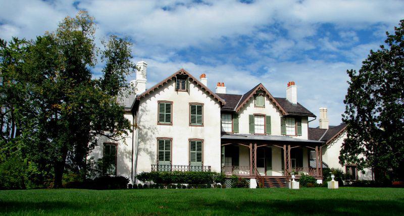 The Cottage Package It may be called a Cottage, but this spacious Gothic Revival home is a true Presidential retreat and features high ceilings, handsome wood paneling, marble fireplaces, and period