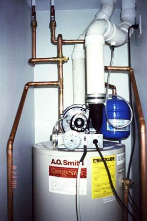 6 Building Science Digest 110 Photograph 2: Domestic Hot Water: Sealed combustion gas water heater provides domestic hot water.