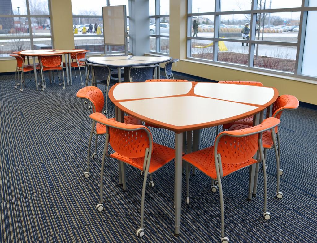 Clara Diamonds stand alone or group together for impromptu team meetings. Clara Diamond tables in Pearl laminate, Oriole and Blue Heron urethane.