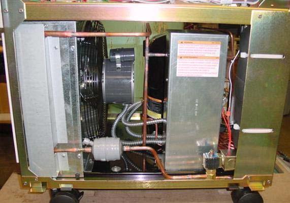 Part V: Refrigeration System Bottom Side View of a RC045 Condenser Condenser fan Evaporator