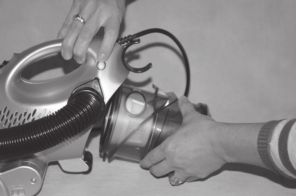 OPERATING THE VACUUM Emptying the Dust Cup Safety First: Always unplug from electrical