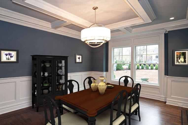 A center island breakfast bar sits under pendant lighting, while food pantry, butler s pantry & powder room are nearby.