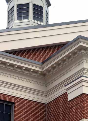 Even more impressive than the flat trim mouldings used on the clock tower are the two build-up configurations that surround the building as an extension of the soffit that are 36"