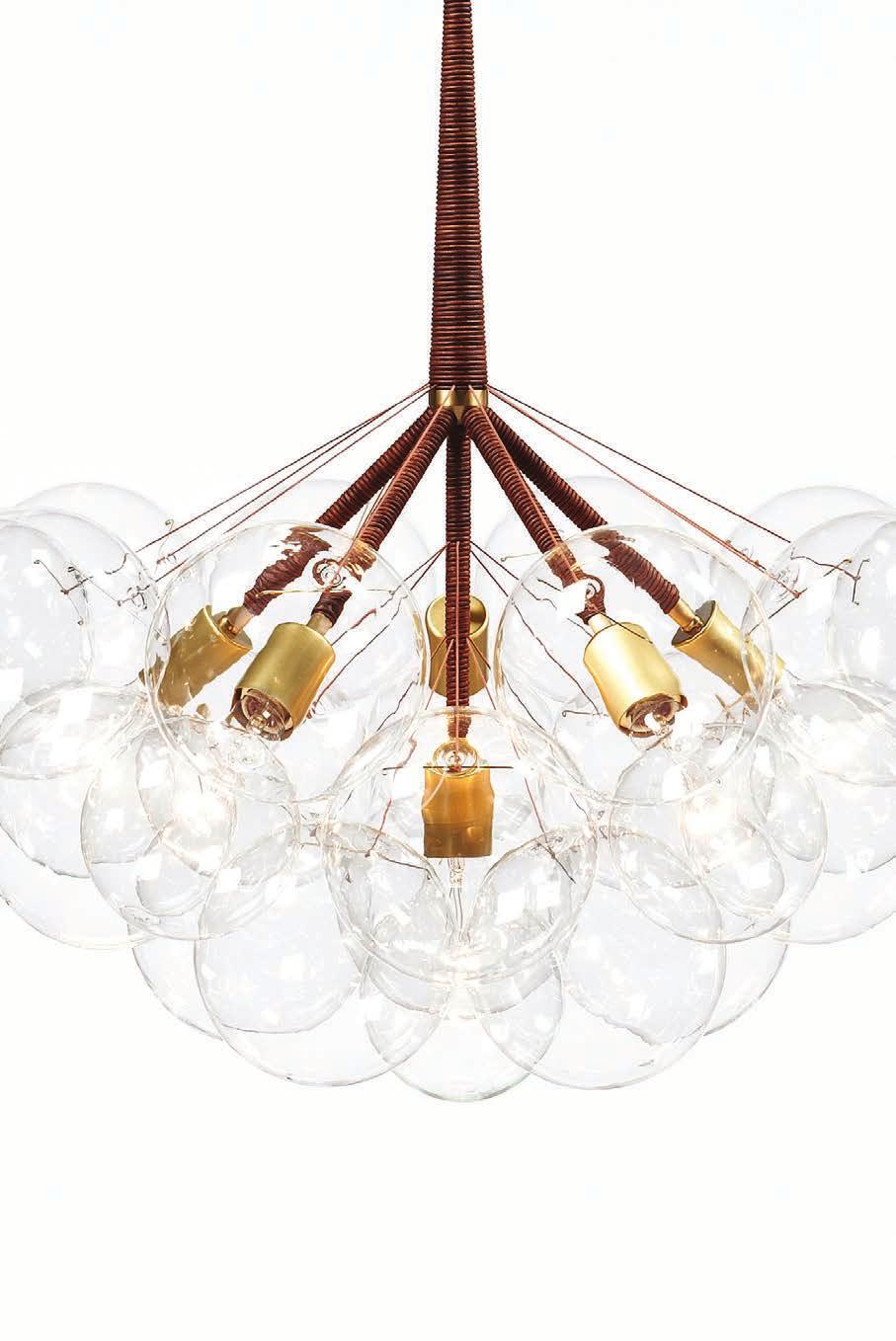 BUBBLE CHANDELIERS The Bubble Chandeliers are delicate and airy compositions of luminous glass globe clusters. The series is comprised of nine distinctive lights of different shape and size.