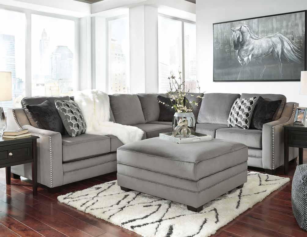 SINK IN LUXURIOUS COMFORT $1999 2 Piece Sectional TRANSITIONAL LIVING ROOM This sectional features sloped arms, nickel studs and is upholstered in