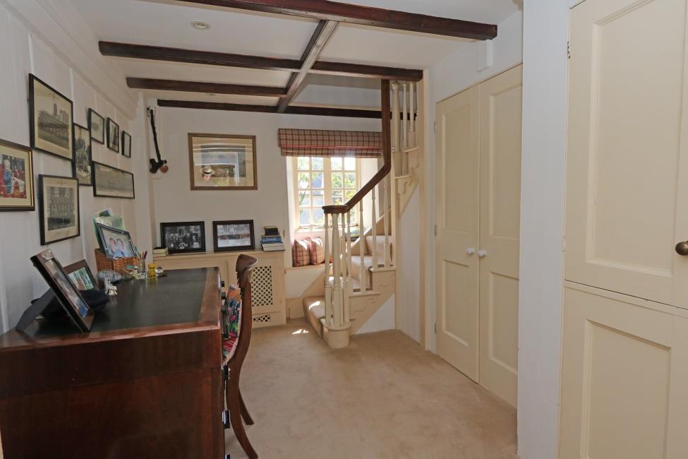 Landing 12 2 x 9 4 fitted wardrobes/storage cupboards, staircase to: SECOND FLOOR Bedroom 3