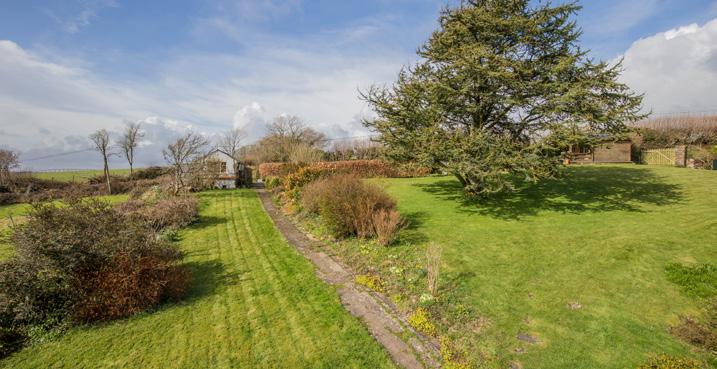 GARDENS AND GROUNDS Old Farm is surrounded by delightful grounds, offering a blend of charming cottage gardens, seating terraces, vegetable plot with greenhouse and open lawns below an impressive