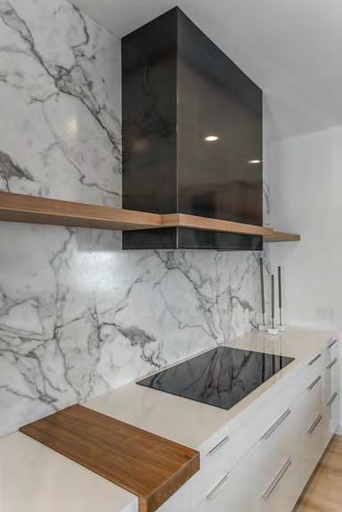 white high gloss cabinets combined with