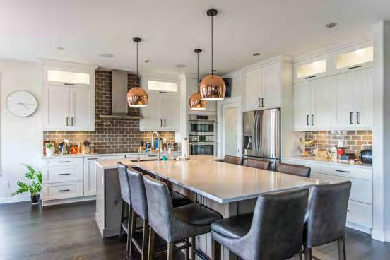 This grand custom kitchen features an
