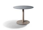 60, 70 DESIGN BY MONICA ARMANI The elegant Nox table features a top from handcrafted glazed lava stone.