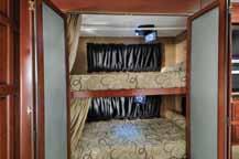 The residential sliding doors provide extra privacy and each bunk comes with an optional