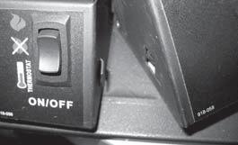 5) Install the control mounting plate over the pin, located at the left base of the unit. Secure with 1 screw as shown.