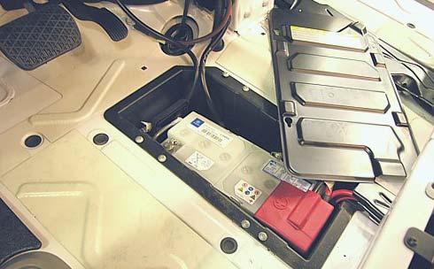 NOTICE Always refasten battery retainers when returning a battery to the compartment.