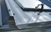uuthe flat portion of the roof panel is corrugated for additional strength and finished with a formed drip edge.