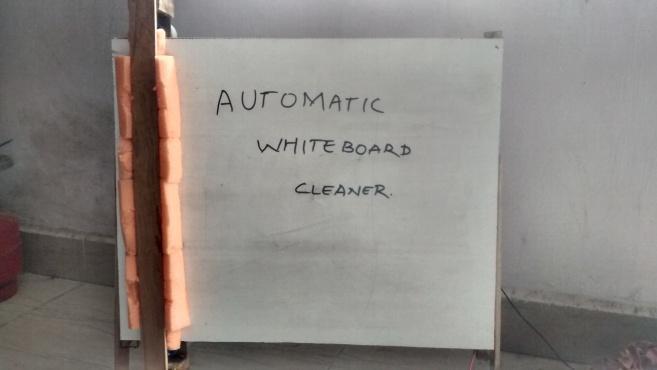 Whiteboard during cleaning process The automatic Whiteboard cleaning robot has been