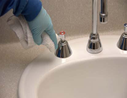 Clean the inside of the sink, the exterior surface Of the sink, and all metal handles and faucets using a clean micro fiber cloth dampened with the disinfectant or